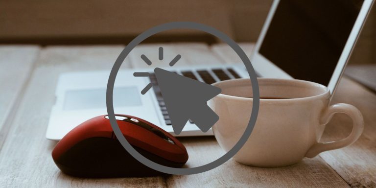 Mouse Placed on a Table With Pointer Icon