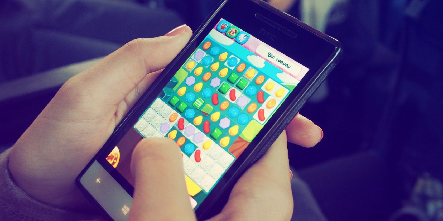 Person playing mobile game