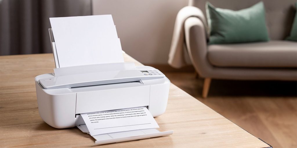 Wireless printer on a wooden desk in the living room.jpg