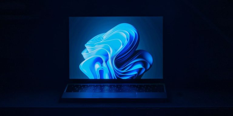 laptop running windows 11 dark room 1