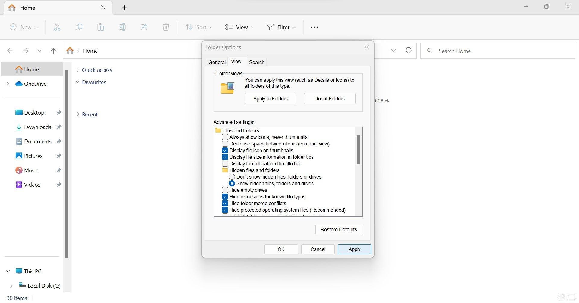 在文件资源管理器的文件夹选项窗口中选中显示隐藏文件文件夹和驱动器的圆圈