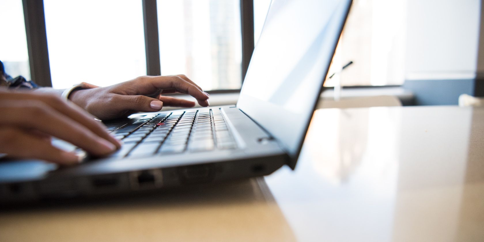 a man works on his laptop