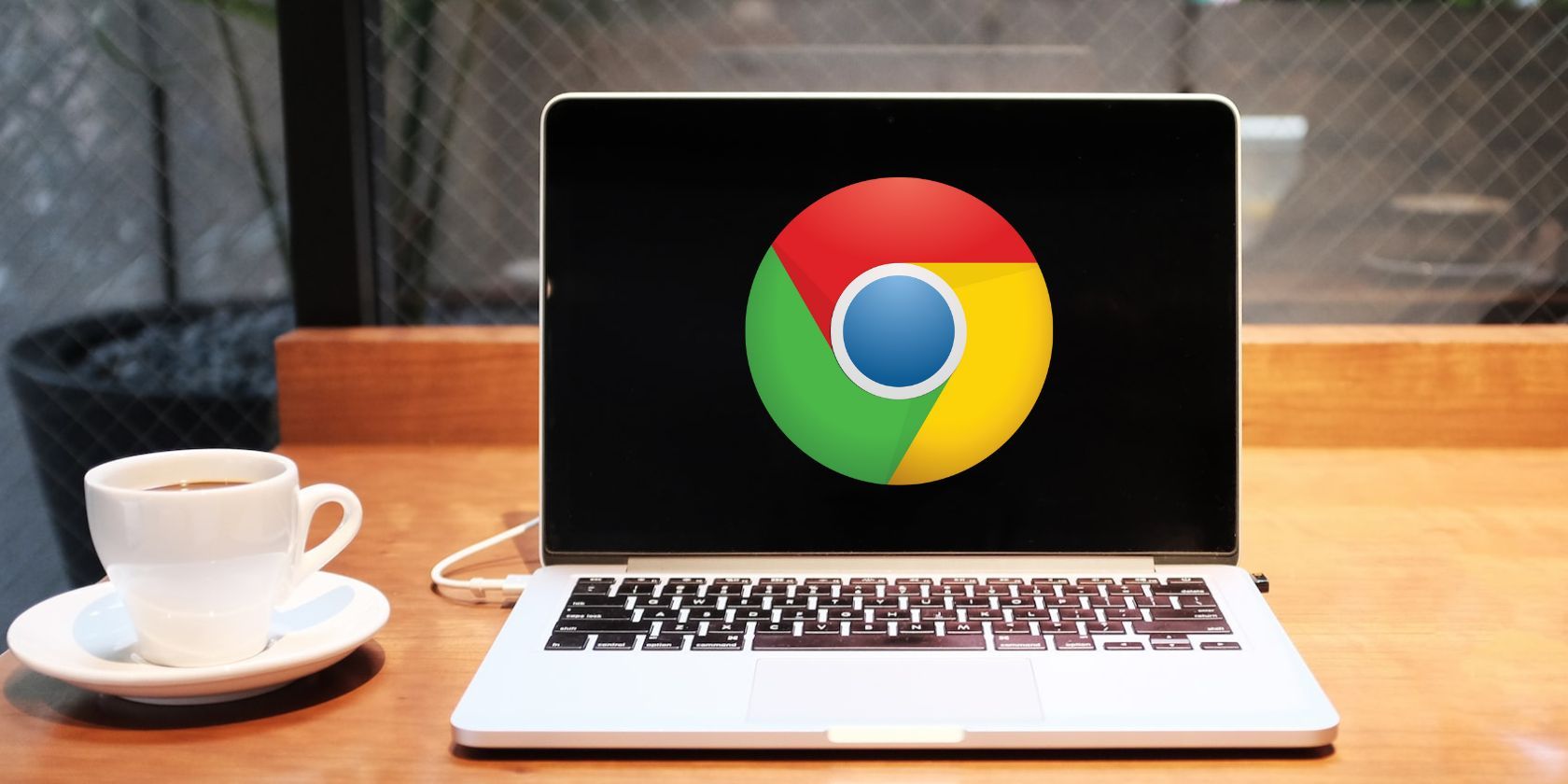 A Silver Laptop With A Google Chrome Logo On Screen.jpg
