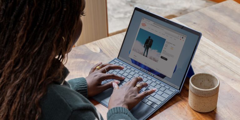 a woman is using her laptop 2
