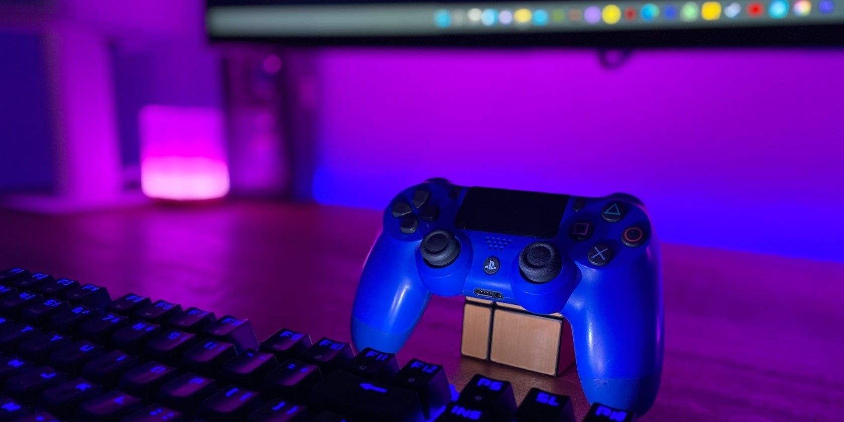 a controller on top of a keyboard