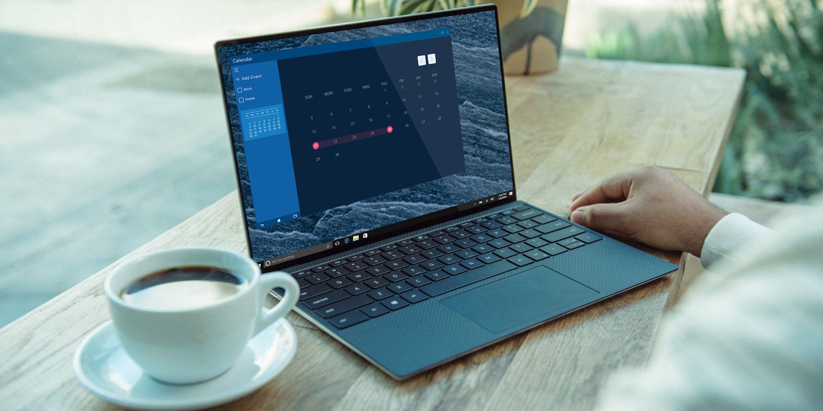 laptop on a wooden desk