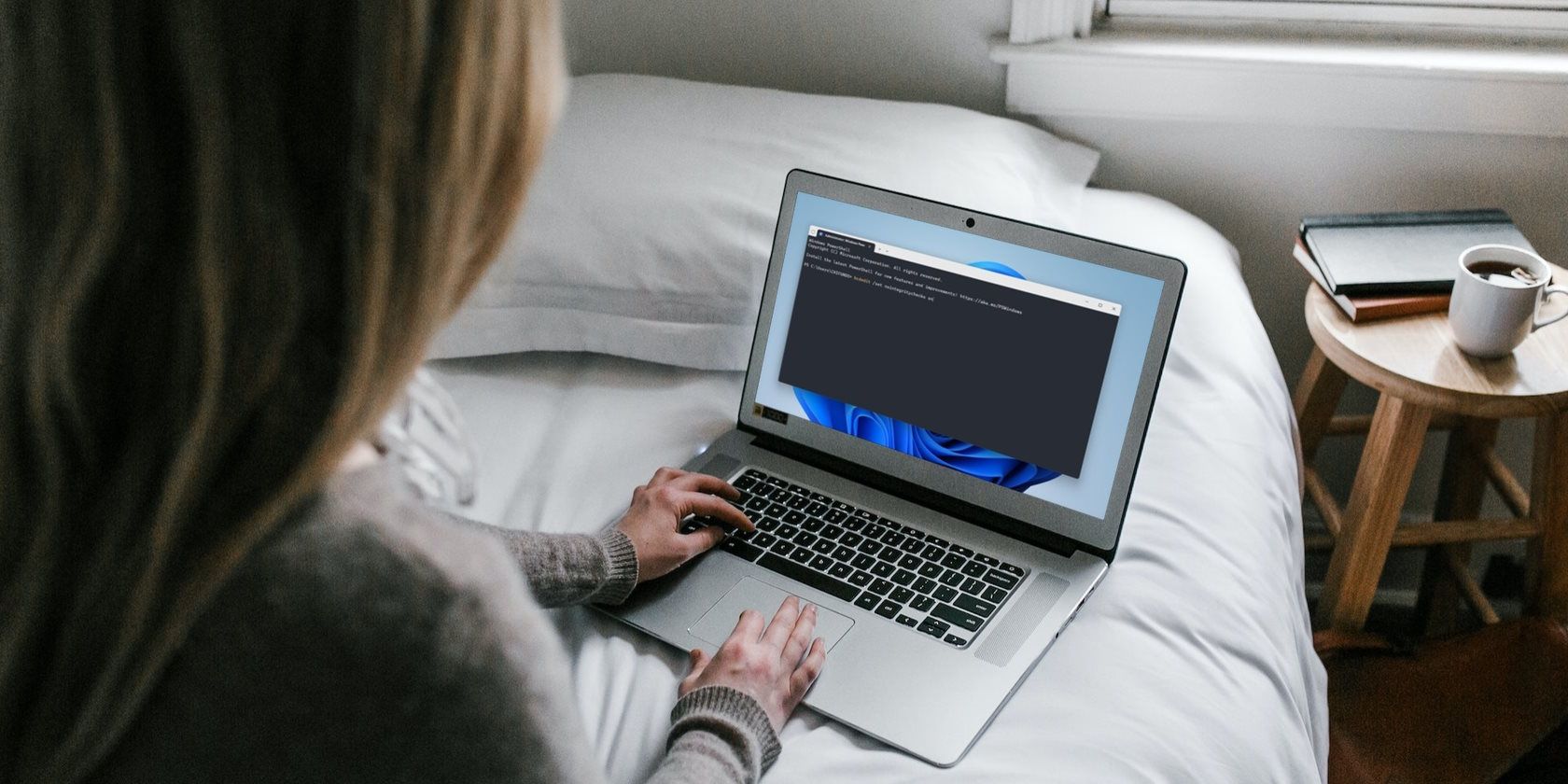 Woman Using Windows Computer On Bed 1.jpg