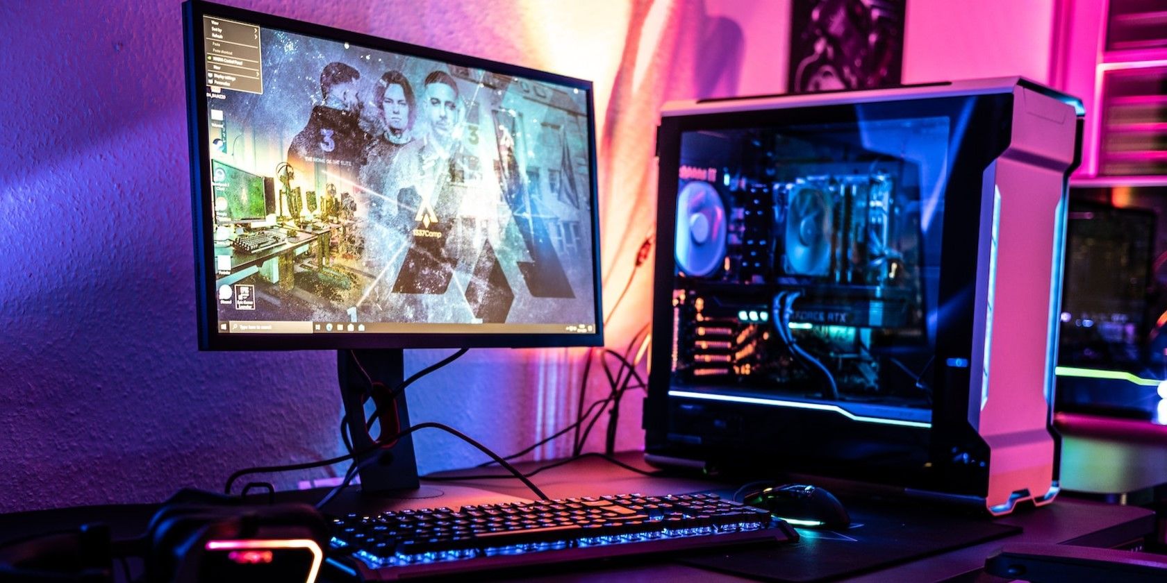 A desktop computer on a wooden desk.jpg