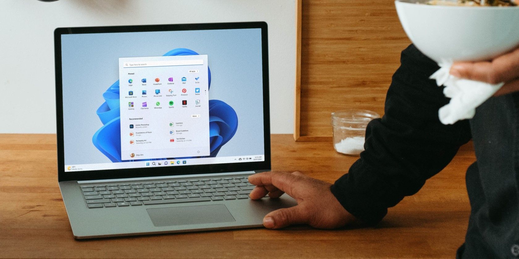 a windows laptop on a wooden table