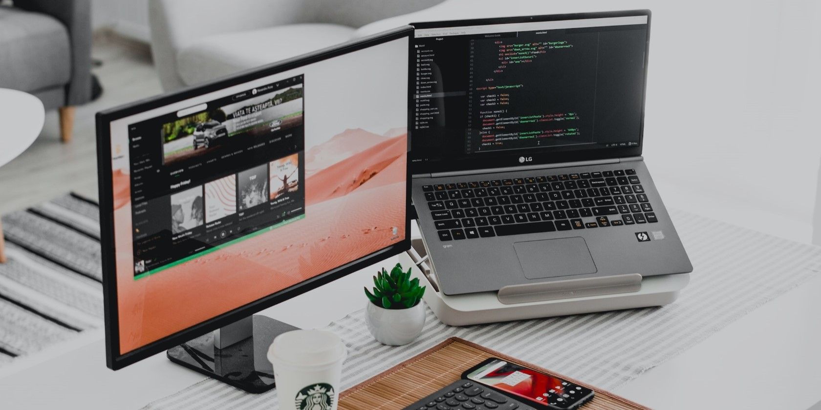 Black Monitor And A Laptop On A Table.jpg