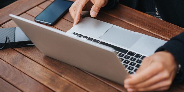 Person using an external storage device on a computer