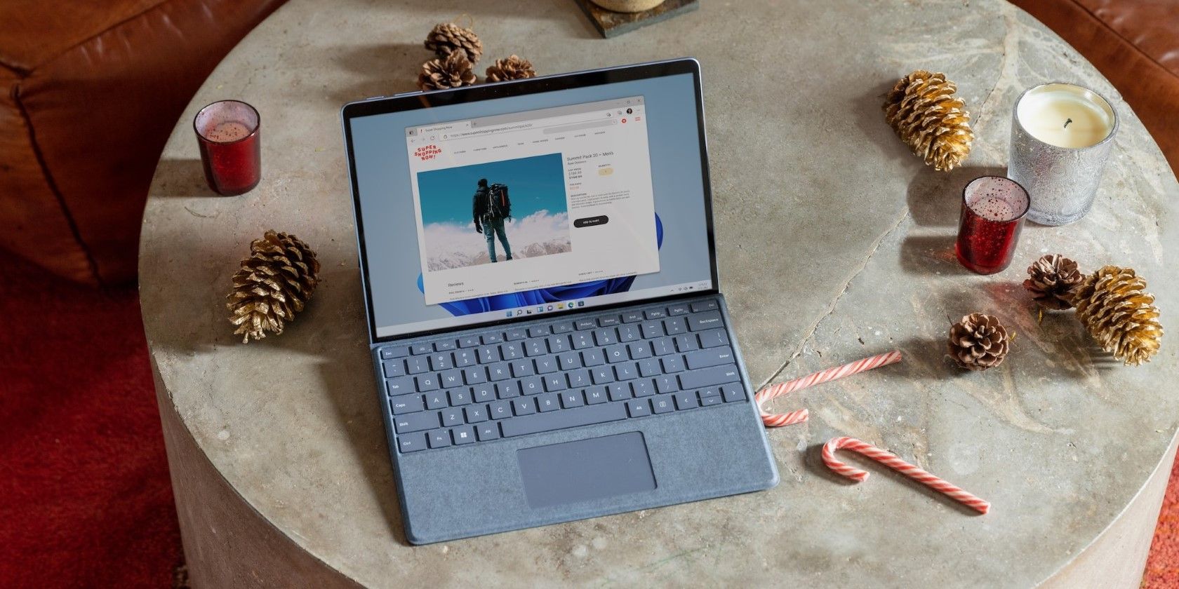 A Laptop On A Gray Round Table.jpg