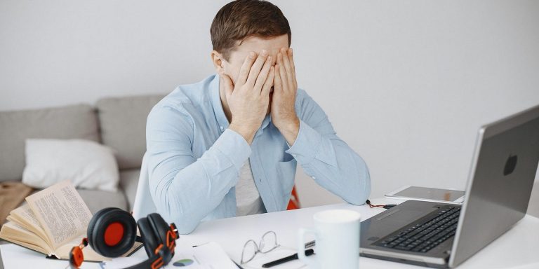 frustrated laptop user